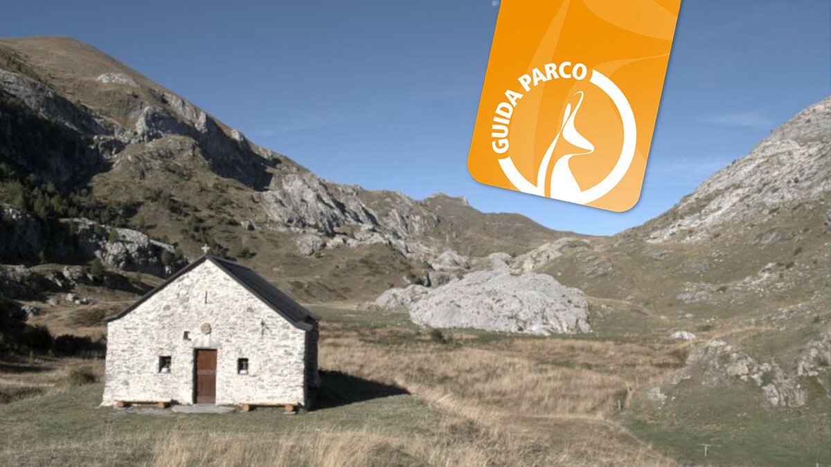 Lo scatto di G. Cavagnino mostra la chiesa di Sant'Erim. In alto a destra il logo delle escursioni con la Guida Parco. Fine della descrizione.
